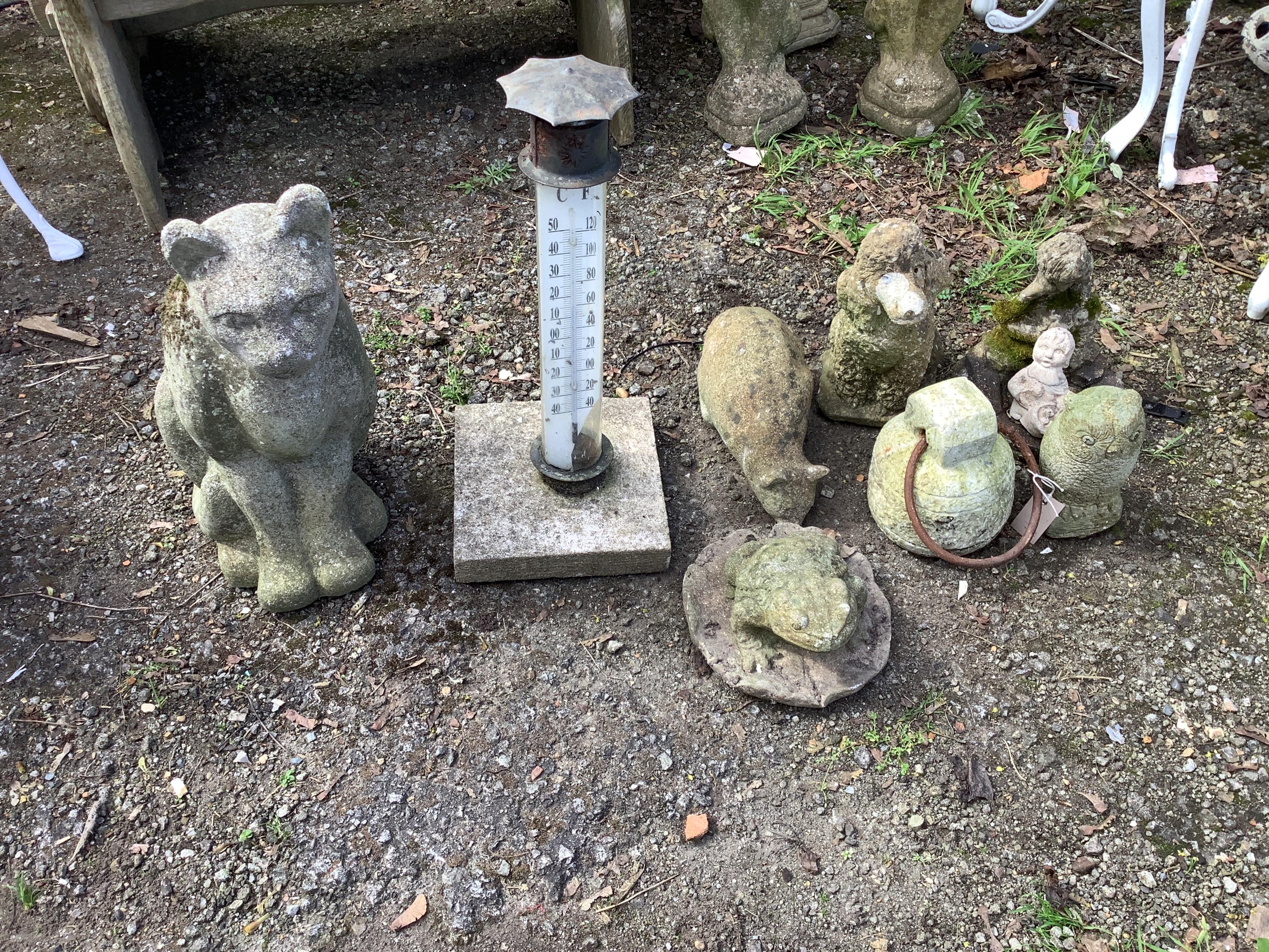 Eight reconstituted stone garden ornaments, largest 53cm together with a garden thermometer